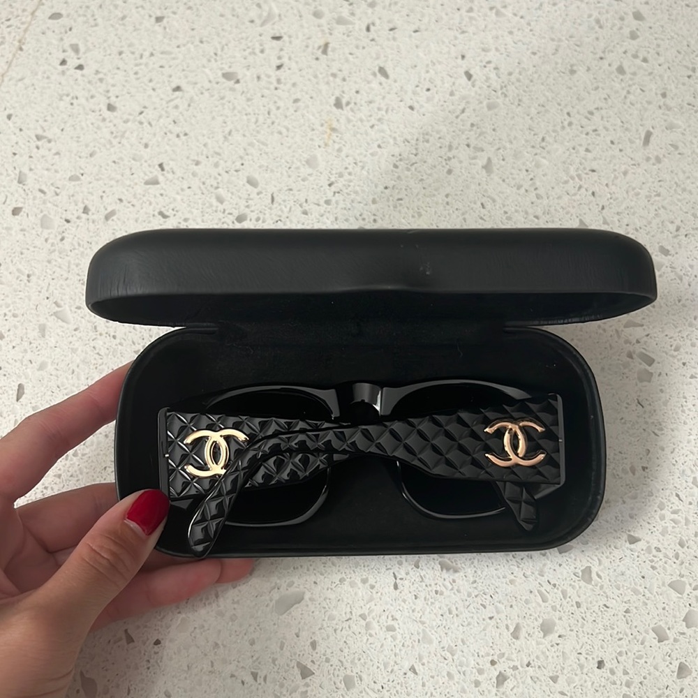 CHANEL Black Sunglasses with Gold Accents. No scratches. Includes Chanel Case.